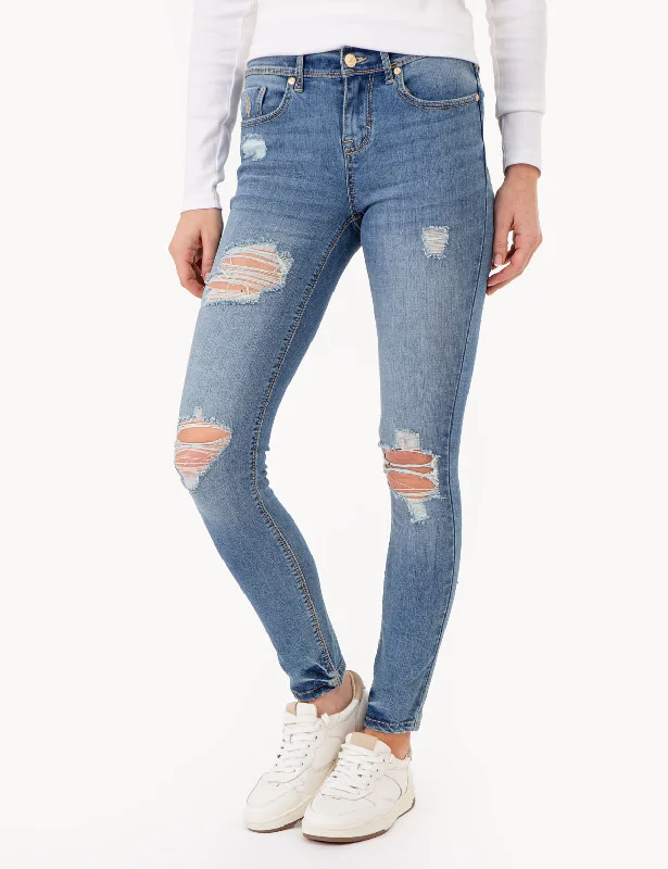 Distressed women jeans for a trendy and edgy lookSUPER SKINNY JEANS